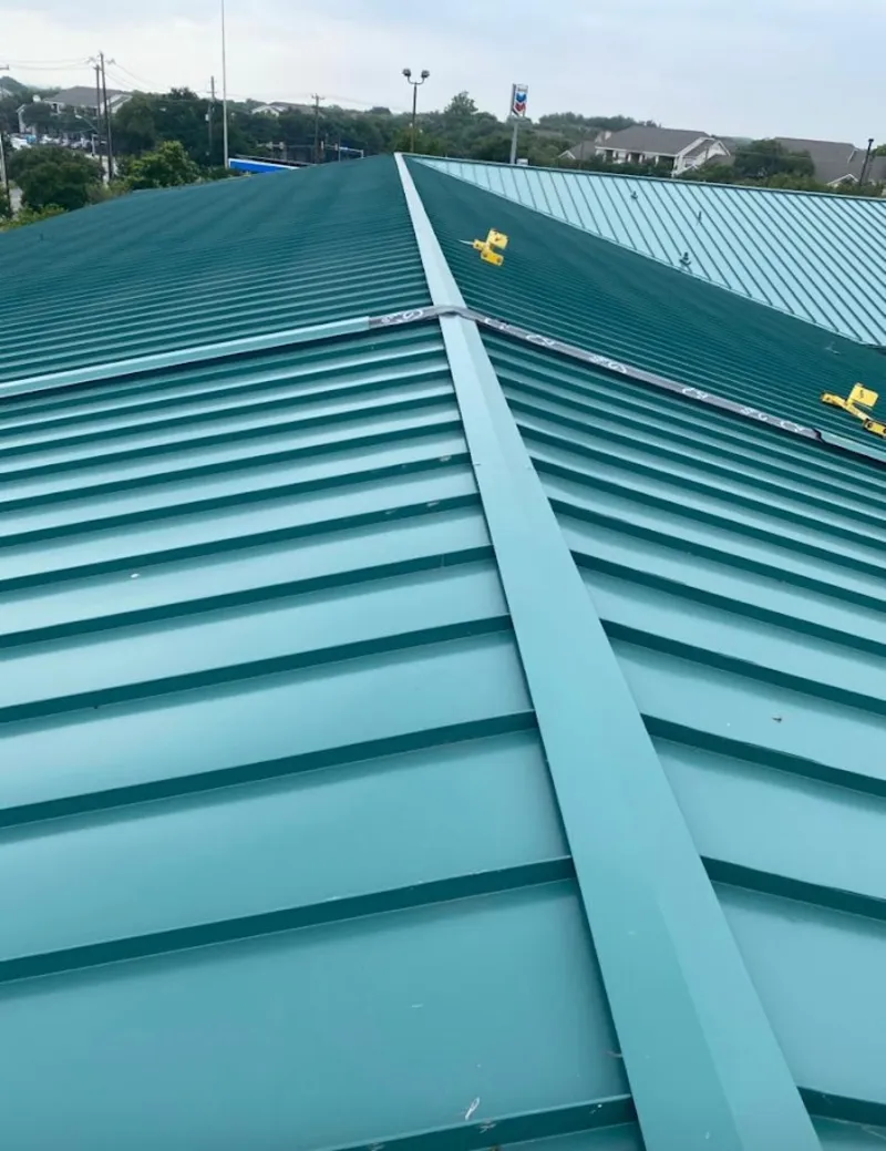 Green commercial metal roof ridge and valley for Metal Roof Repair in San Antonio