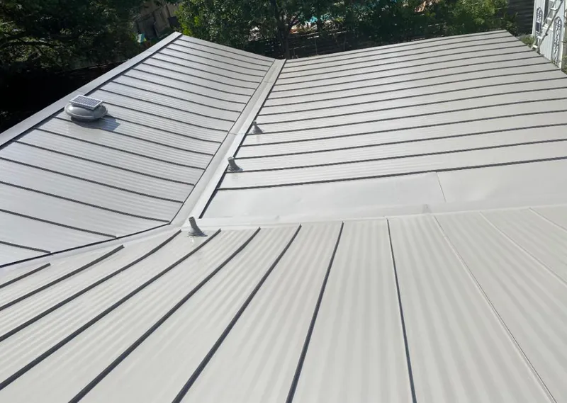 Solar attic fan installed on a metal roof for Roof Ventilation in San Antonio