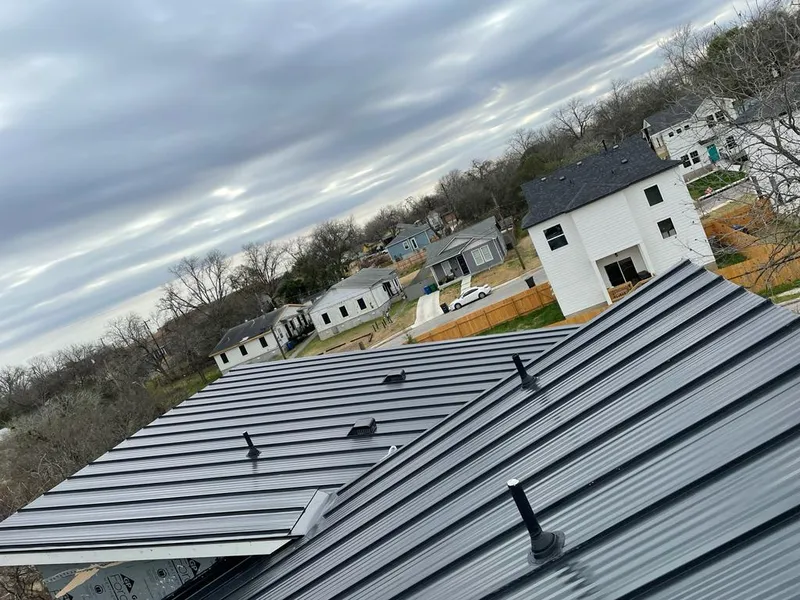 Standing seam metal roof panels with vents for Skylight Repair in San Antonio